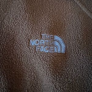The North Face charcoal grey fleece zip up jacket 2XL.